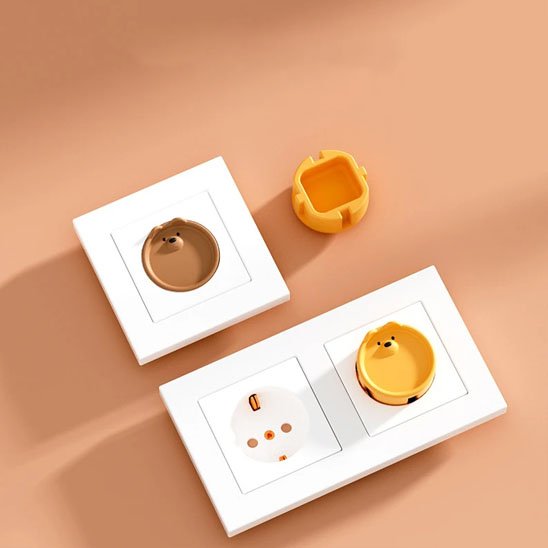 Cache prise bébé motif animal jaune brun sécurité électrique enfant chambre colorée ludique